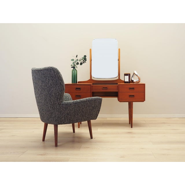 The armchair was made in the 1970s, Italian manufacture. Legs made of solid wood. The armchair has undergone upholstery...