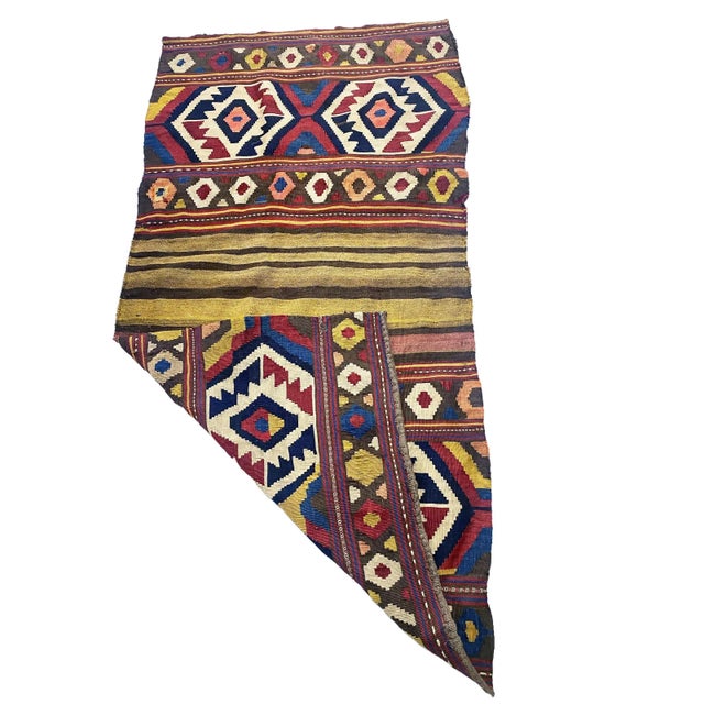 This Antique and Rare Tribal Caucasian Kuba Kilim stands at 5'6" by 2'9" (68" h by 35" w) and dates back to the late 19th...
