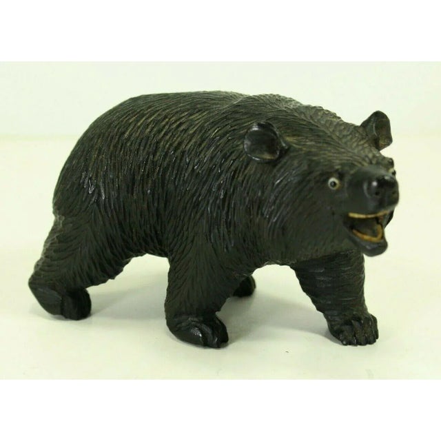 An outstanding wooden bear figurine with glass eyes Exceptional carving, a very skillful representation of an enraged...