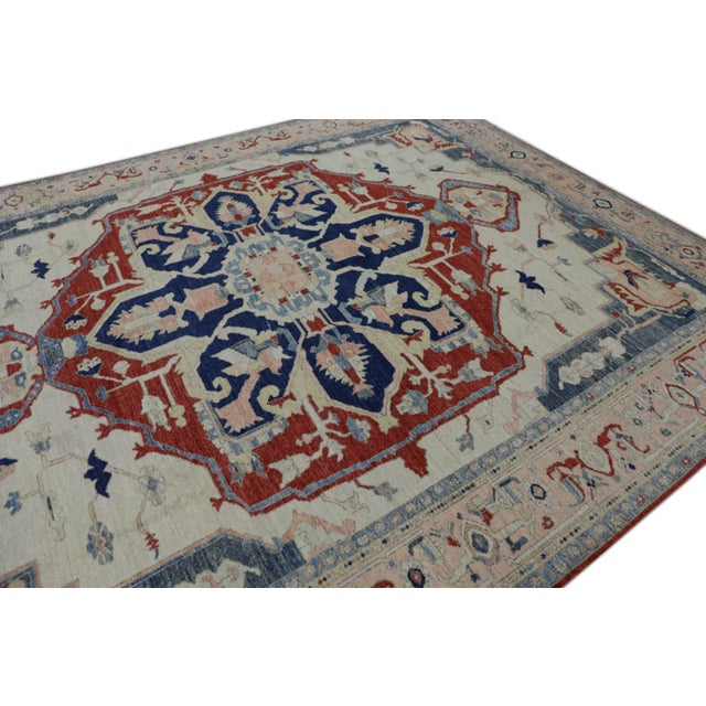This modern finewoven Turkish Oushak rug is a stunning piece of art that has been handwoven using traditional techniques...