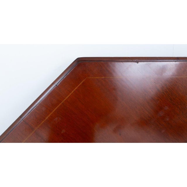 Large Victorian mahogany octagonal centre / dining table Circa 1880 This rather unusual table stands upon shaped legs with...