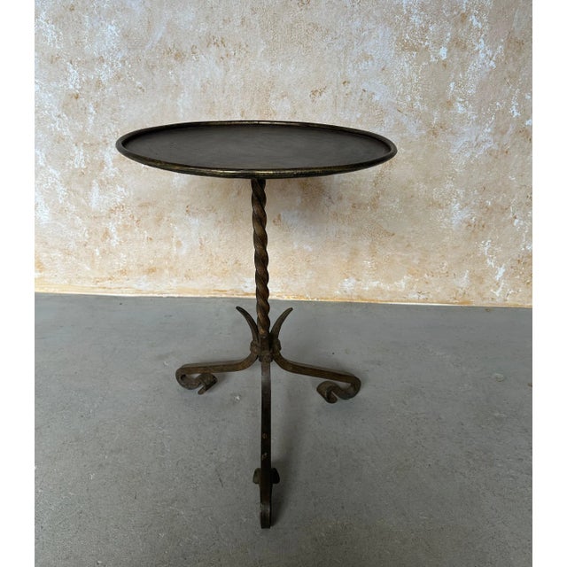 This exceptional vintage 1950s Spanish drinks table is a versatile and elegant addition in any setting. Hand forged from...