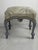 French Country style pouf with rope details, 1970 Gray in color, featuring sinuous legs and decorative woven rope details....