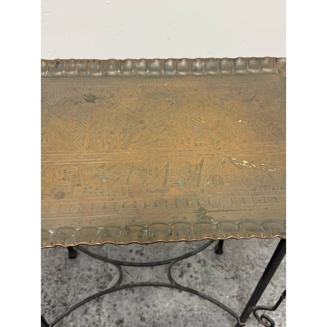 Design Plus Gallery presents a pair of Vintage Egyption Revival Brass Tray + Wrought Iron Side Tables. Each table is...