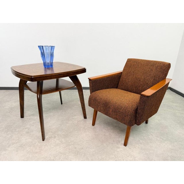 An iconic Mid-Century Modern "Crab" coffee table designed by the renowned Czechoslovak designer Jindřich Halabala and...