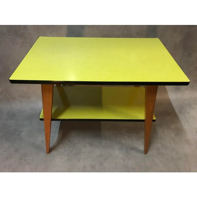 Yellow Formica table, compass beech legs, 2 trays, 50s.