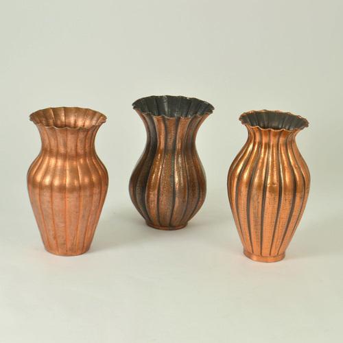 Monumental vases by the early modernist Italian designer Egidio Casagrande (1911-1962). Hand hammered copper vases or...