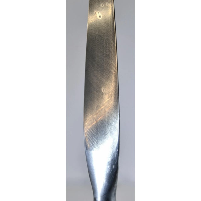 Vintage metal airplane propeller, mounted on a custom made metal museum base. The base is made so you can remove the...