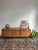 Elegant sideboard by meredew with refined handles integrated into the cabinet. manufacturer: meredew, uk period: 1960s...