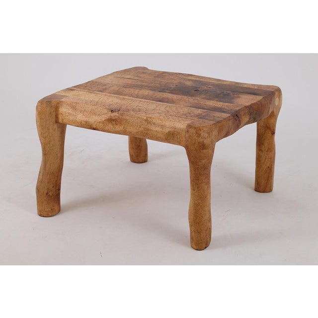Discover the charm of this handcrafted wooden coffee table, a piece that seamlessly blends functionality with artistic...