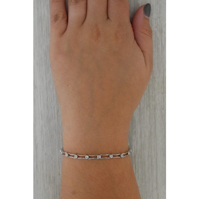 Gemstone Information: - Natural Diamonds - Total Carats - 0.48ctw Cut - Round Brilliant Color - I - K Clarity - SI1 - SI2...