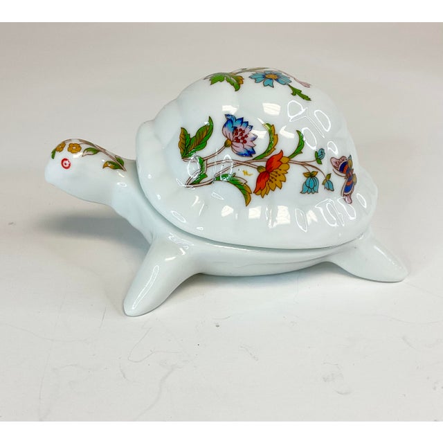 We loved this adorable little guy the minute we found him. The porcelain lidded box is in the shape of a white Turtle with...
