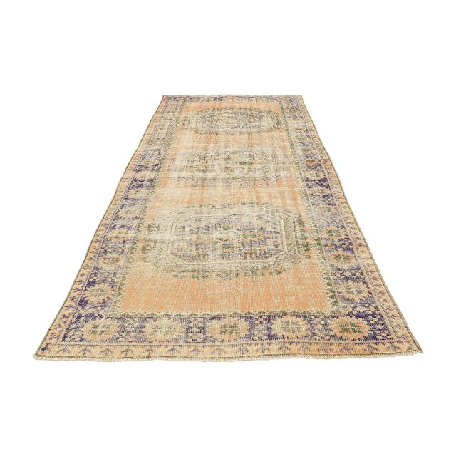 Handknotted vintage wool rug from Oushak region of Turkey. Approximatelly 50-60 years old. In very good condition.