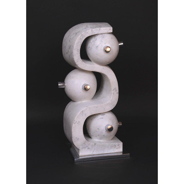 Hugo Verheyen, Incomprehension I Sculpture, 1980s, Carrara Marble and Chromed Metal, in Very Good conditions. Designed...