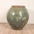 A massive celadon glazed Chinese pot.