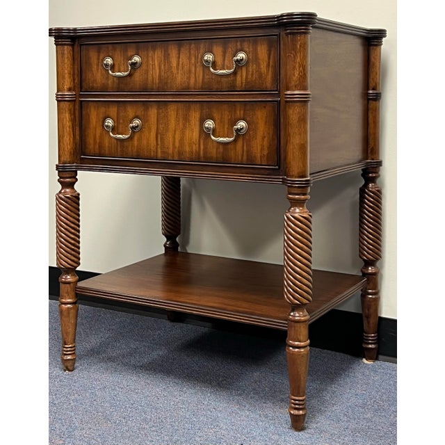 The “Melville” nightstand by Ethan Allen from their Newport Colllection. Crafted in mahogany with two dovetailed drawers...