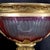 Antique (late 19th century) ruby flashed glass bowl cut to clear with ormolu bronze mounts.
