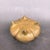 Traditional Chinese brass incense burner with melon lobed body, a pair of upright yuanbao (ingot) shaped handles and three...