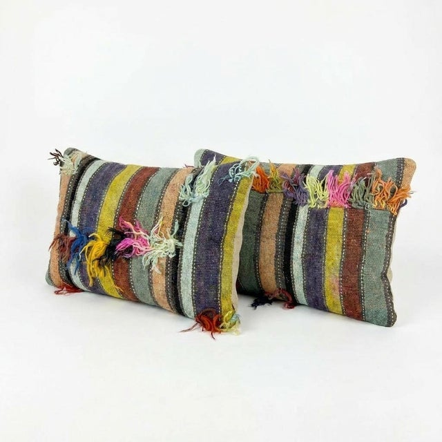This beautiful 16'' x 24'' pillow cover set was made from authentic Turkish rug pieces. Bright colors of wool adorn the...