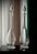 A refined pair of antique clear glass decanters dating from the late 19th to early 20th century. Each piece has a tall...