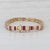 Gemstone Information: - Natural Rubies - Total Carats - 5.50ctw Cut - Baguette Color - Red Treatment - Routinely Enhanced...