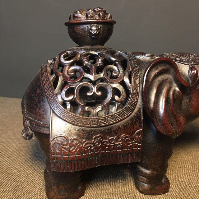 This exquisite piece is masterfully crafted from heavy solid copper/bronze with a rich, dark purplish-brown patina....