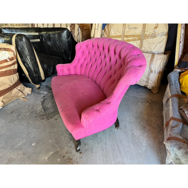 An exquisite and authentic 19th-century French Napoleon III period settee. This striking piece features its distinctive,...