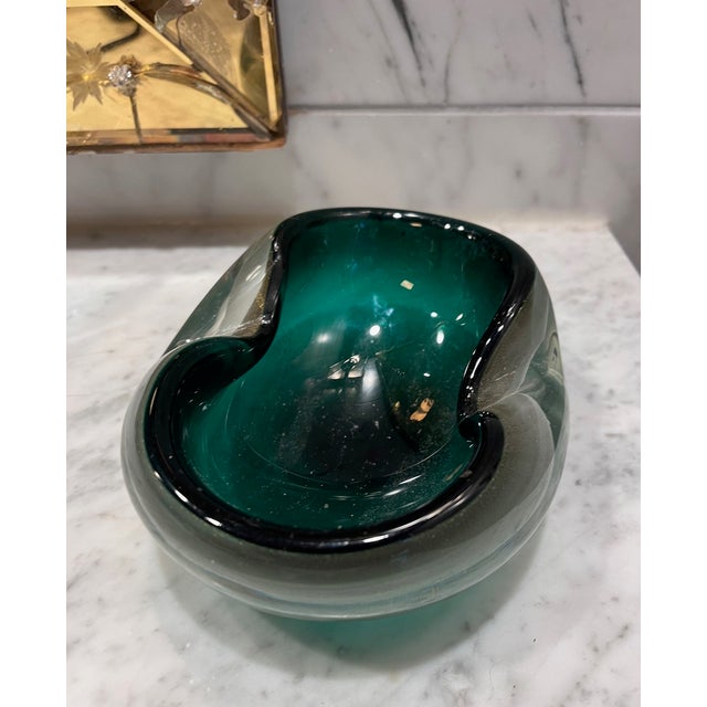 MCM Murano attributed green and black cased glass ashtray or catchall. Elegant sculptural organic form with pinched sides....