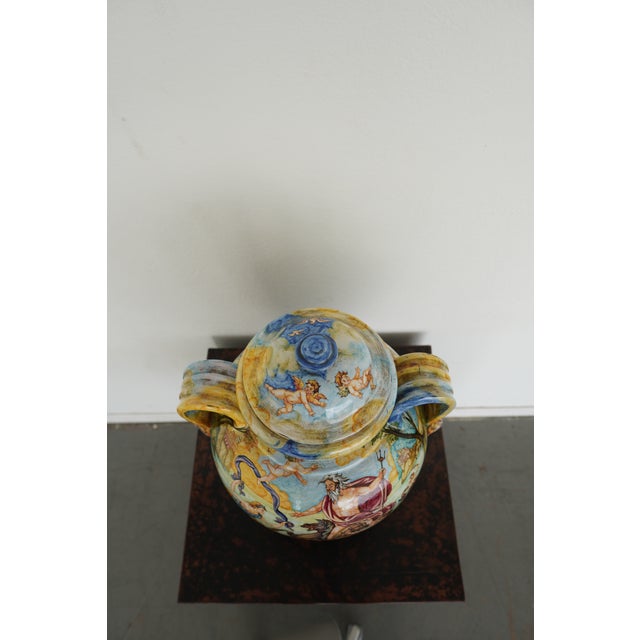 Impressive vintage ceramic classical decorative vase, richly hand-painted with an elaborate mythological scene featuring...