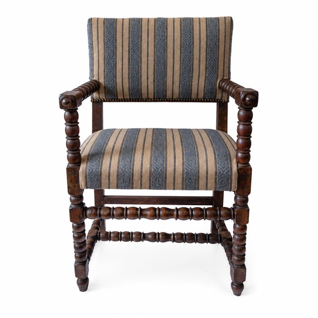 19c. English walnut wood bobbin turned armchair in custom upholstery.