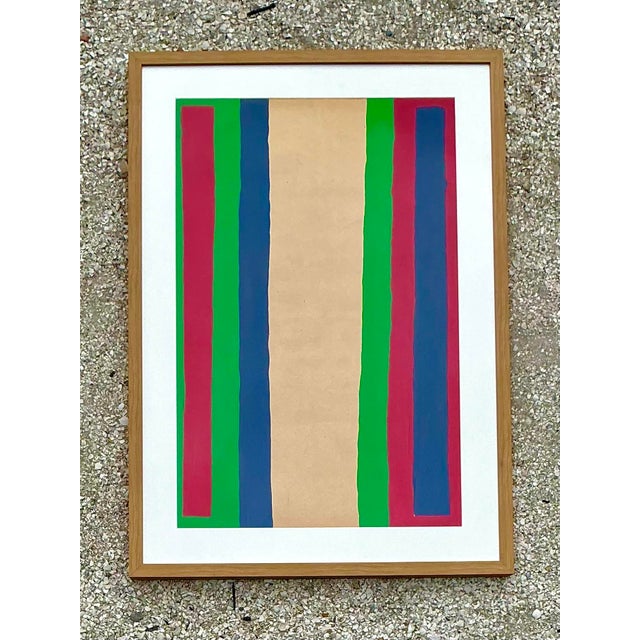 This striking original abstract work on paper is a vibrant celebration of mid-century geometric design, offering an...