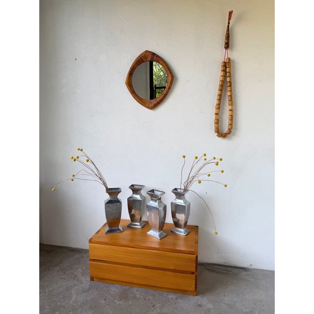 Set of four cast aluminum vases. We love their striking, graphic shape. In good condition with a patina from use. -...