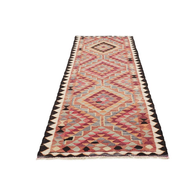 Handwoven vintage decorative kilim runner from Northern Iraq. Approximately 45-55 years old. In very good condition.