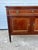 This elegant 19th-century French Louis XVI mahogany buffet features a rich mahogany finish, two paneled doors with...