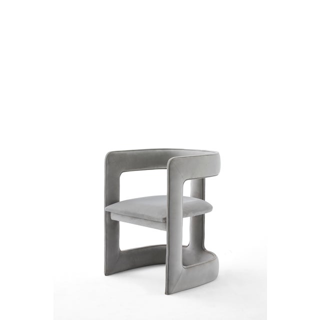 The Barca Dining Chair represents a refined balance between modern design language and everyday comfort. Defined by its...