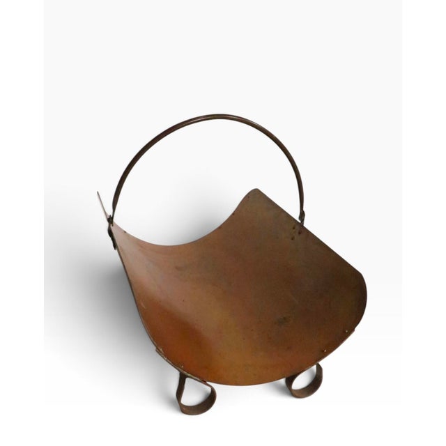 Vintage firewood, log holder, in good, original condition. The log holder features a swing handle, a scoop form base, with...
