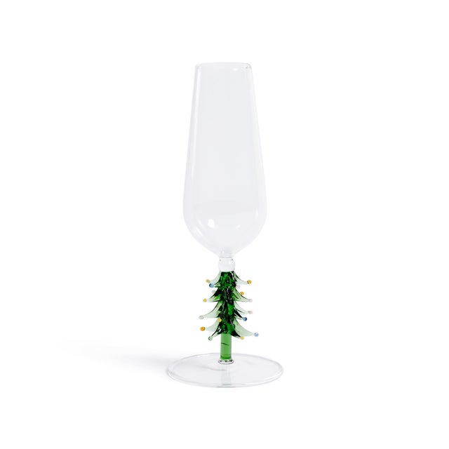 Toast the season in style with this festive set of four champagne flutes, each featuring a whimsical holiday tree detail...