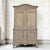 A 19th century Country French Normandy Louis Philippe period buffet à deux corps crowned with an arched top known as a...