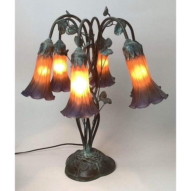 Vintage Tiffany Pond Lily 6 Light Table Lamp 19” tall By 18” in diameter. Wonderful condition with no chips or cracks in...