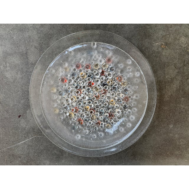 Set of two textured glass plates with bubbles on the underside design by Jan Sylwester for Drost, Poland. The larger plate...