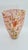 A large, decorative vase made of artistic glass, crafted using the hand-forming technique. Characteristic colorful...