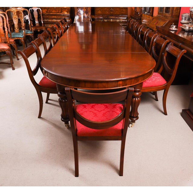 This is a beautiful dining set comprising an antique George III flame mahogany dining table, Circa 1810 in date, and a...