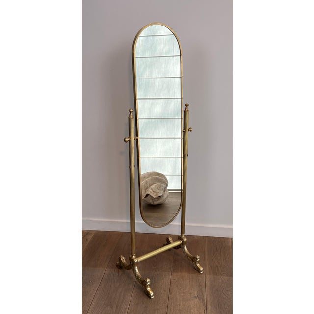 This beautiful, removable, decorative, neoclassical-style psyche mirror is made entirely of brass with a beveled mirror....
