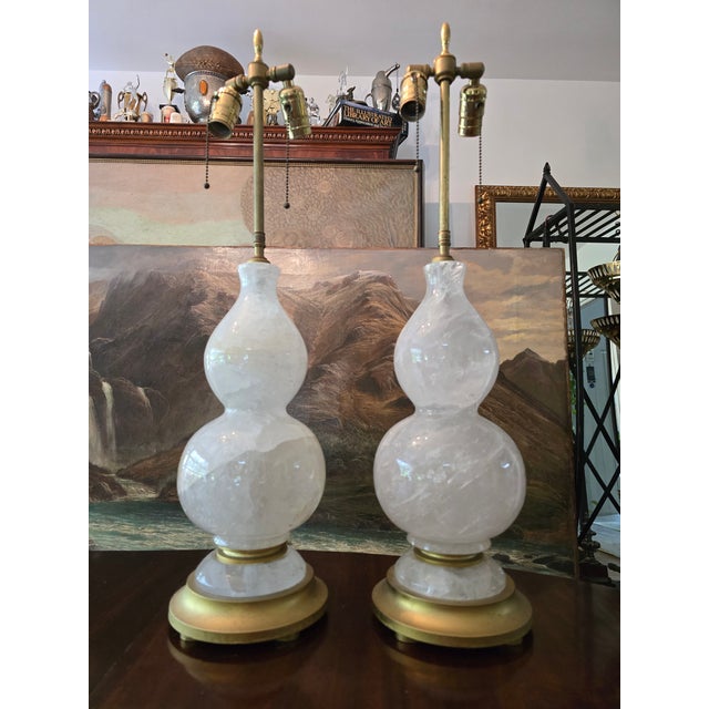 A post mid century modern era pair of gourd shape rock crystal lamps . Absolutely genuine one hundred percent solid exotic...