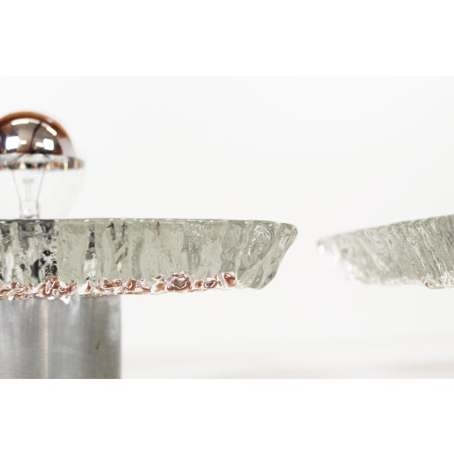 Large and heavy set of 'Ice Gas' wall lamps by Peill & Putzler, produced in Germany during the 1970s. Both are in very...