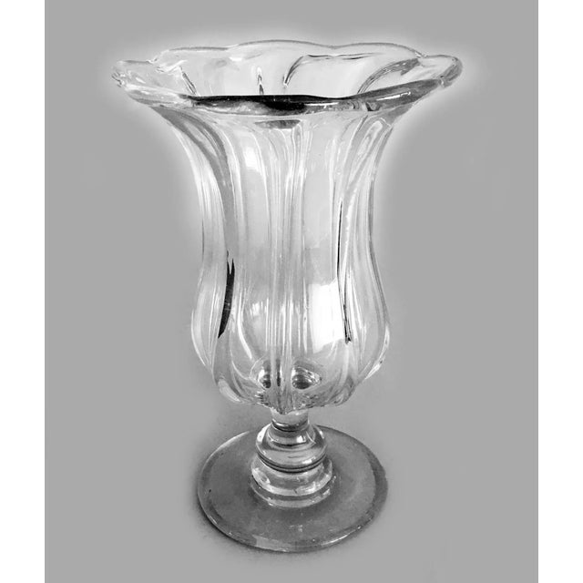 Victorian elegant molded glass celery vase with scalloped and flared top edge, the baluster shape decorated with...