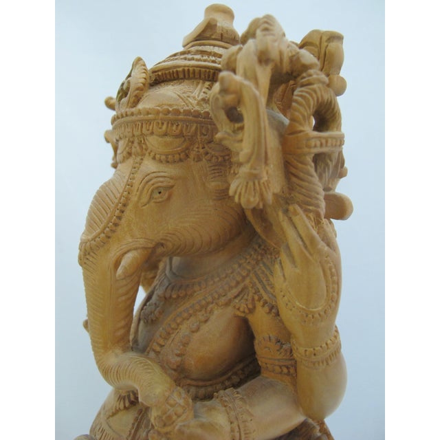 Seated Lord Ganesha Holding Fruit Carved Wood Hindu Deity God Statue on Pedestal For Sale - Image 10 of 13