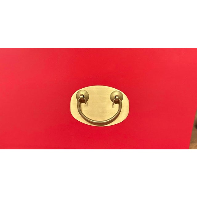 This piece is sure to be noticed with expected curves and a glorious confident scarlet. We love the details and...