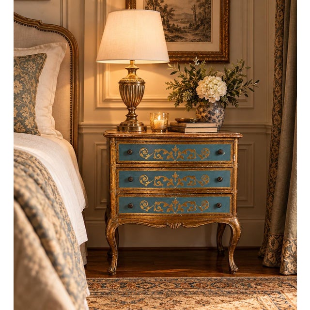 Elegant 1950s Italian Hollywood Regency-style three-drawer nightstand featuring a beautiful distressed teal-blue finish...