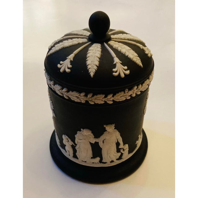 Classic Wedgwood covered jar, neoclassic figures around, acanthus leaves on cover
